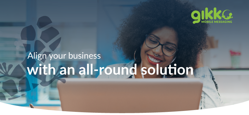 Woman in front of a laptop with statement about aligning your business with an-all round solution including gikko branding